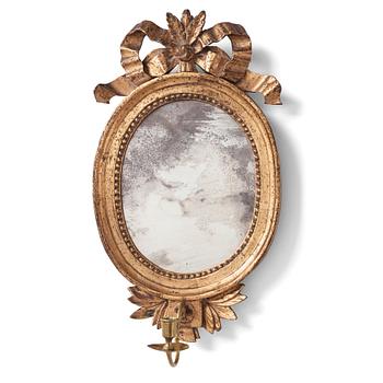 A pair of Gustavian late 18th century one-light girandole mirrors.