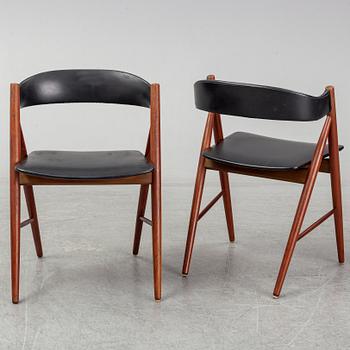 Four 1960s teak chairs.