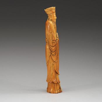 A carved ivory figure of one of the immortals, China presumably early 20th century.