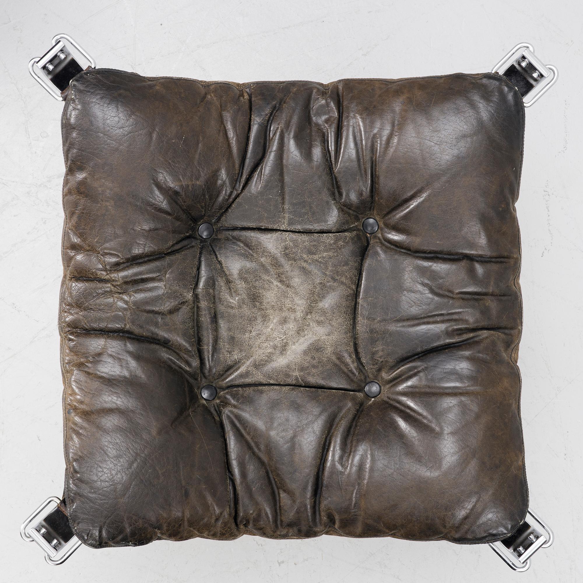 Sigurd Ressel, a pair of 'Falcon chair' easy chairs with an ottoman, Vatne Möbler, Norway, 1970s.