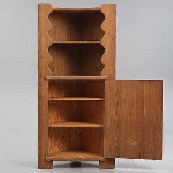 Axel Einar Hjorth, a stained pine "Utö" corner cabinet, Nordiska Kompaniet, Sweden, 1930s.
