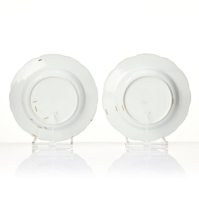 A set of 8 Chinese Export armorial soup dishes, Qing dynasty, circa 1790's.