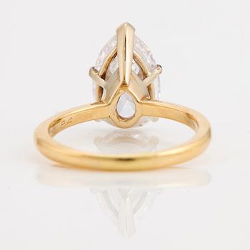 A pear cut diamond ring.