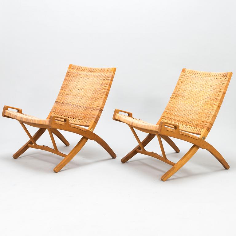 HANS J WEGNER, A pair of JH-512 folding chairs for Johannes Hansen, Denmark, early 1980s. Model designed in 1949.