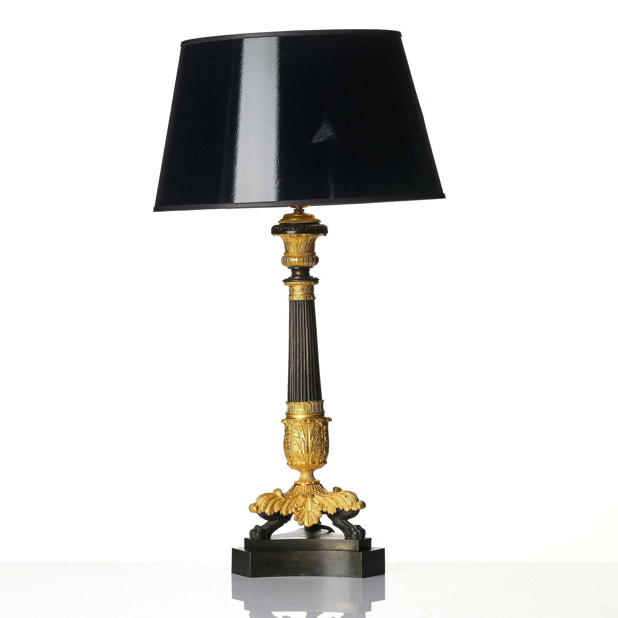 A French Louis Philippe ormolu and patinated bronze lamp, first part 19th century.