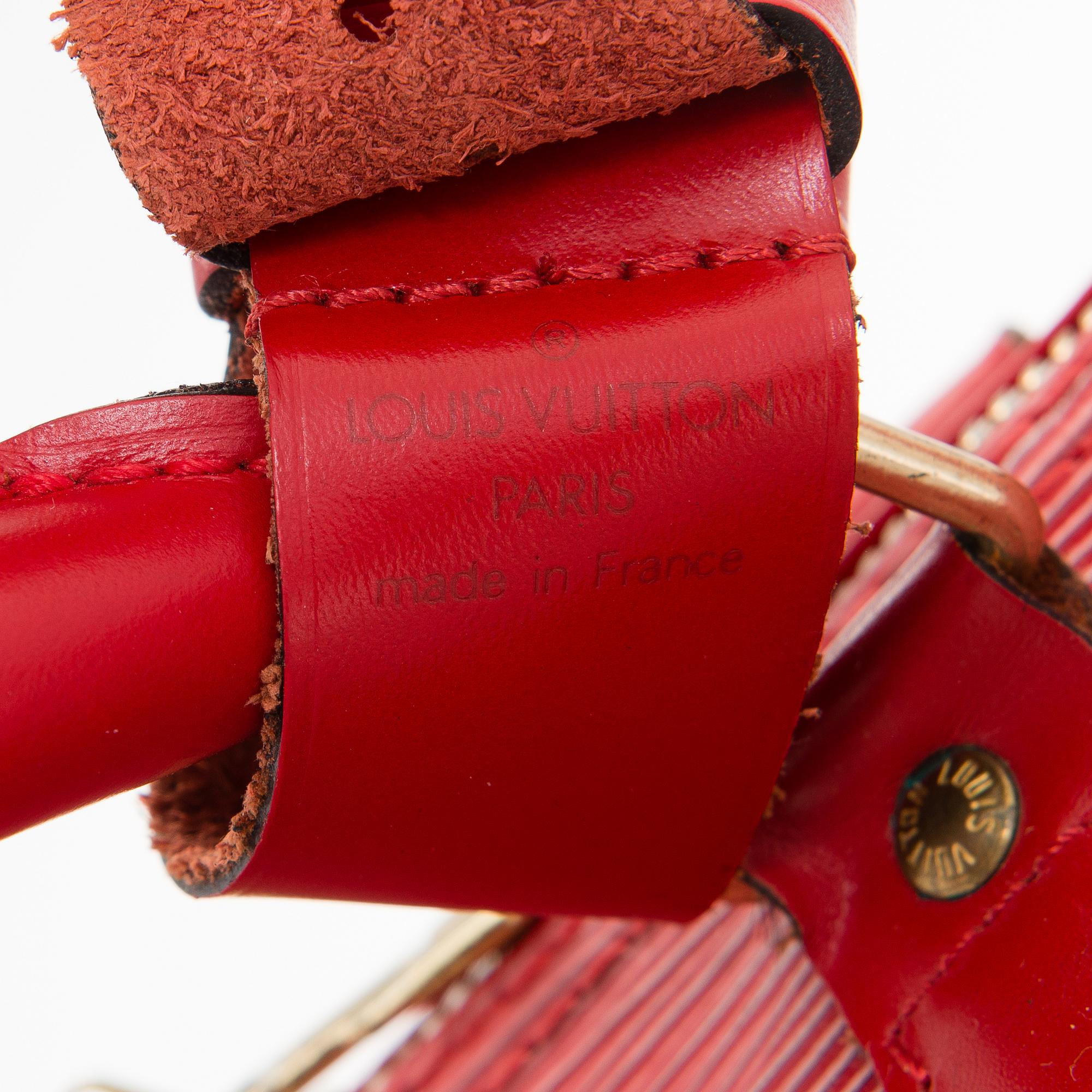 Louis Vuitton, A Red Epi Leather Keepall travel bag.