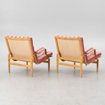 Bruno Mathsson, a pair of "Ingrid" armchairs, Dux, Sweden, second half of the 20th century.