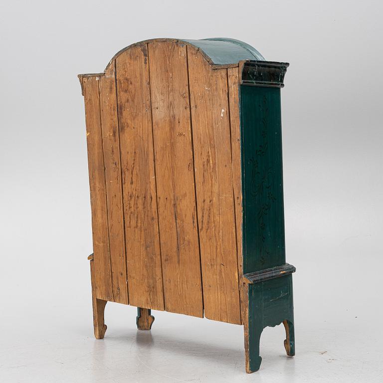 A cabinet, 18th Century.