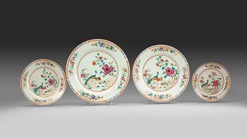 A set of four famille rose 'double peacock' dishes, Qing dynasty, Qianlong (1736-95).
