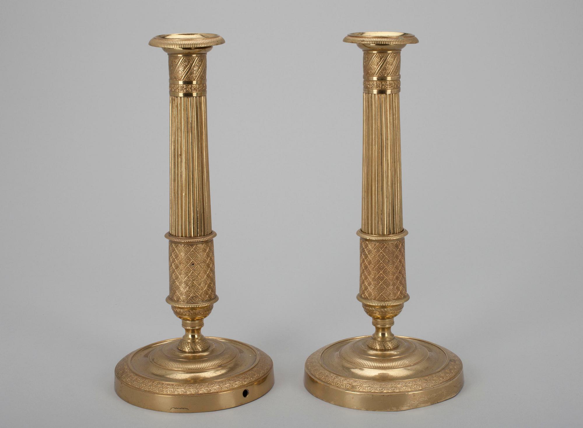 LJUSSTAKAR, ett par, förgylld brons, 1800-tal.