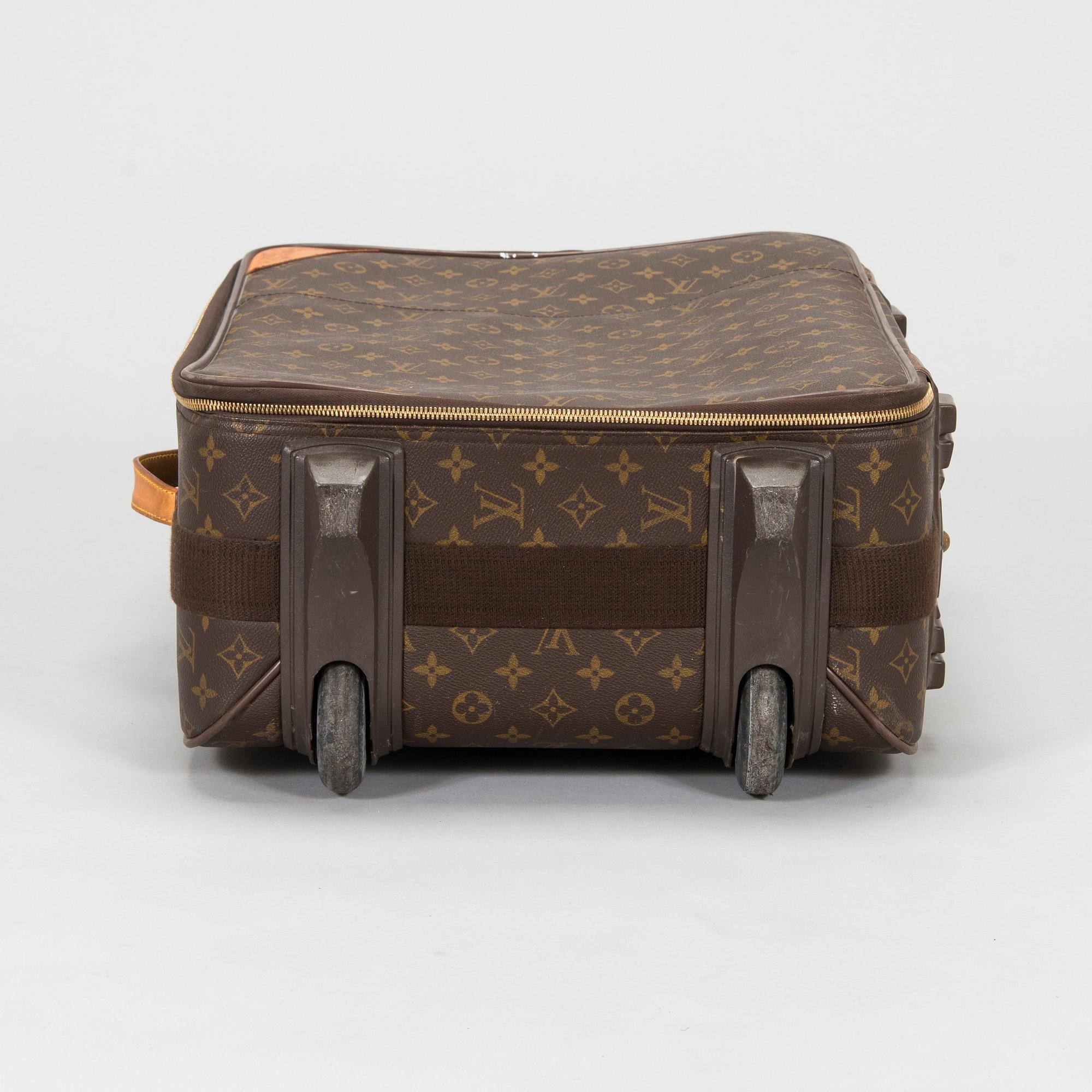 Louis Vuitton, a Monogram Canvas "Pegase 55" suitcase.