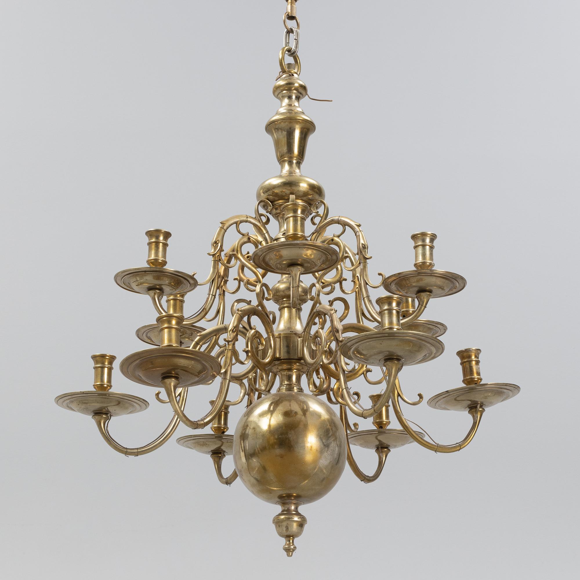 A brass Baroque style chandelier, 20th Century.