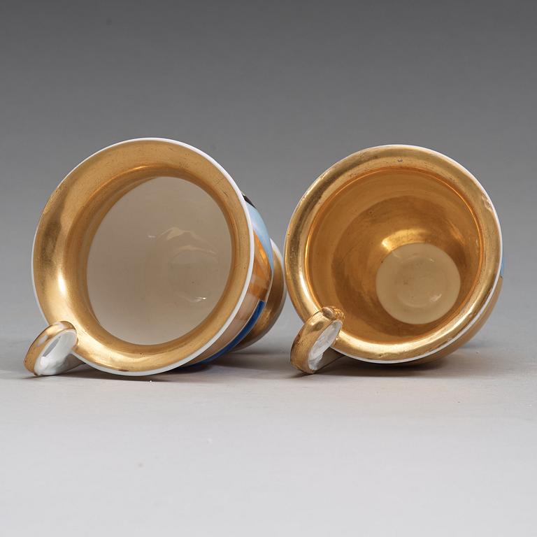 A pair of Russian Gardner Empire cups with stands, early 19th Century.