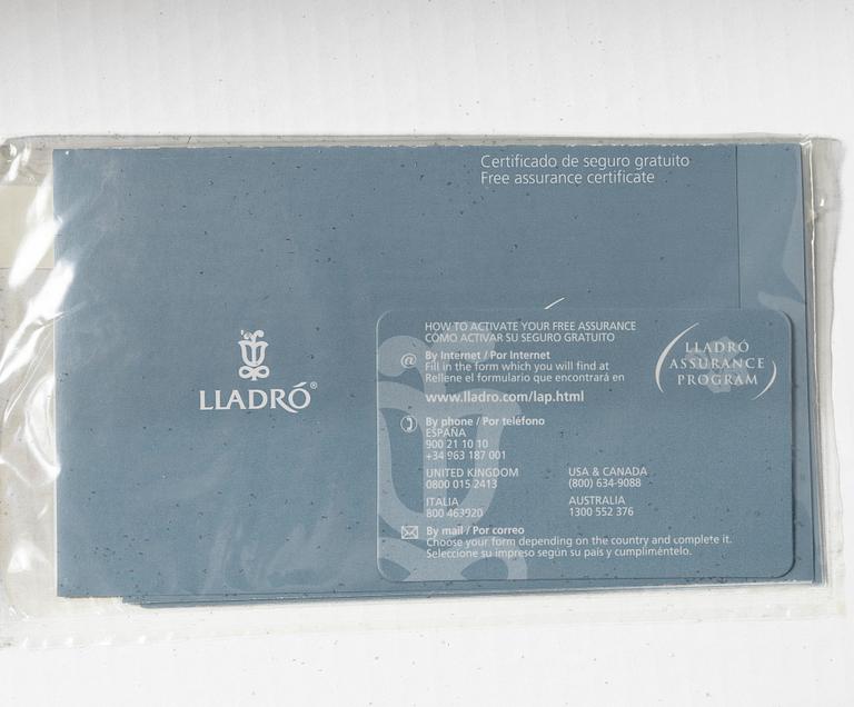 Lladró, figurines, a pair, "Pulcini obelisk enamels left" and "Pulcini obelisk enamels right", Spain.