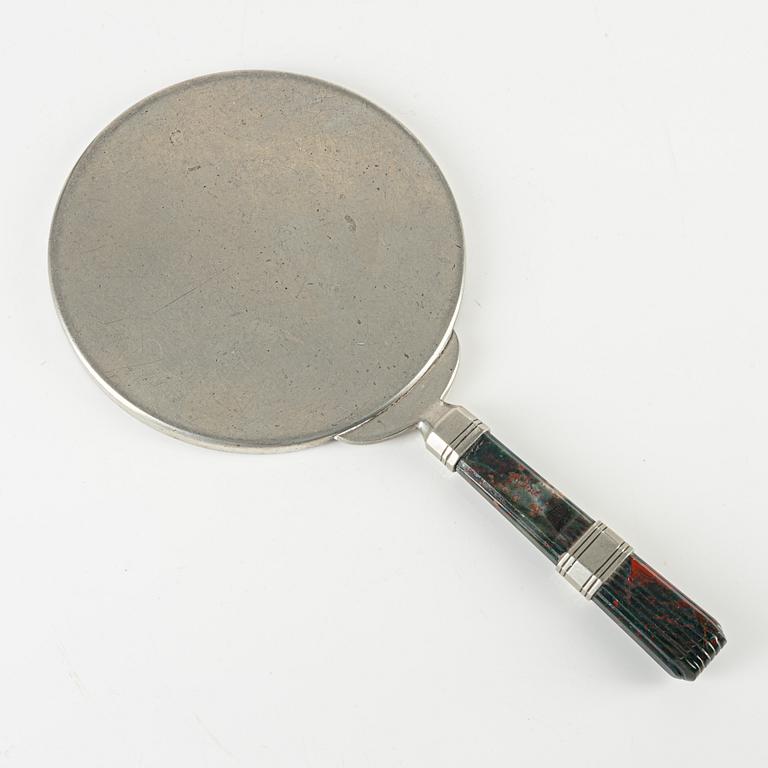 Swedish Grace, a pewter hand mirror, 1930s.