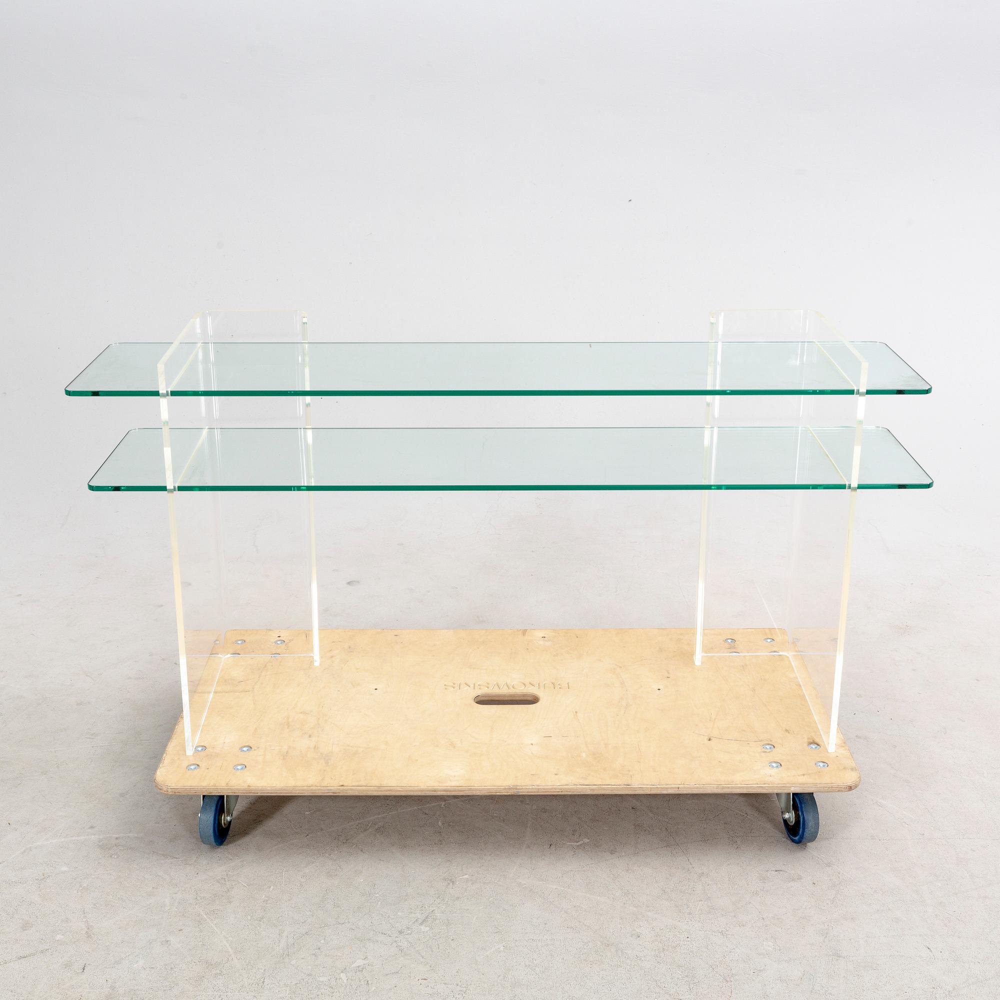 A late 20th century plexi and glass sideboard.