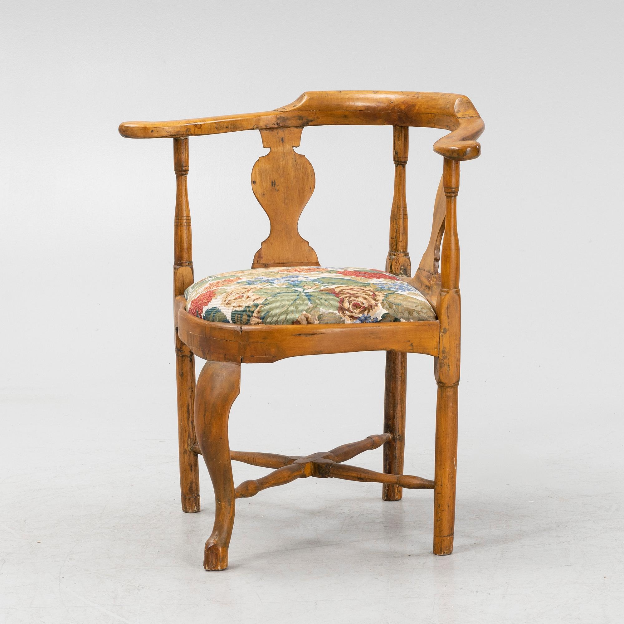 A Rococo armchair, mid 18th century.