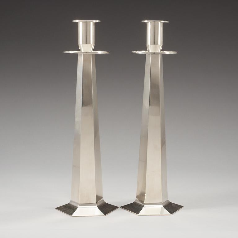 A pair of Wiwen Nilsson sterling candle sticks, Lund 1952 -56.