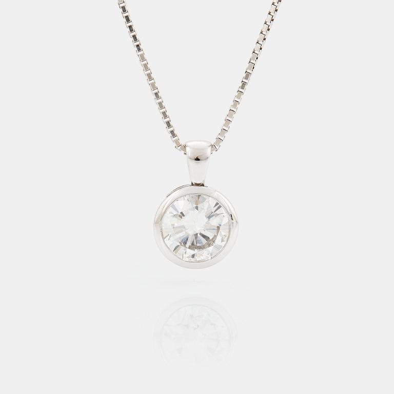 A PENDANT set with a round brilliant-cut diamond.