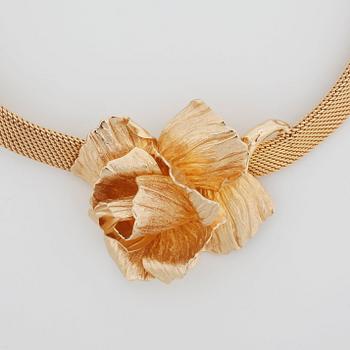 CHRISTIAN DIOR, a gold colored metal necklace.