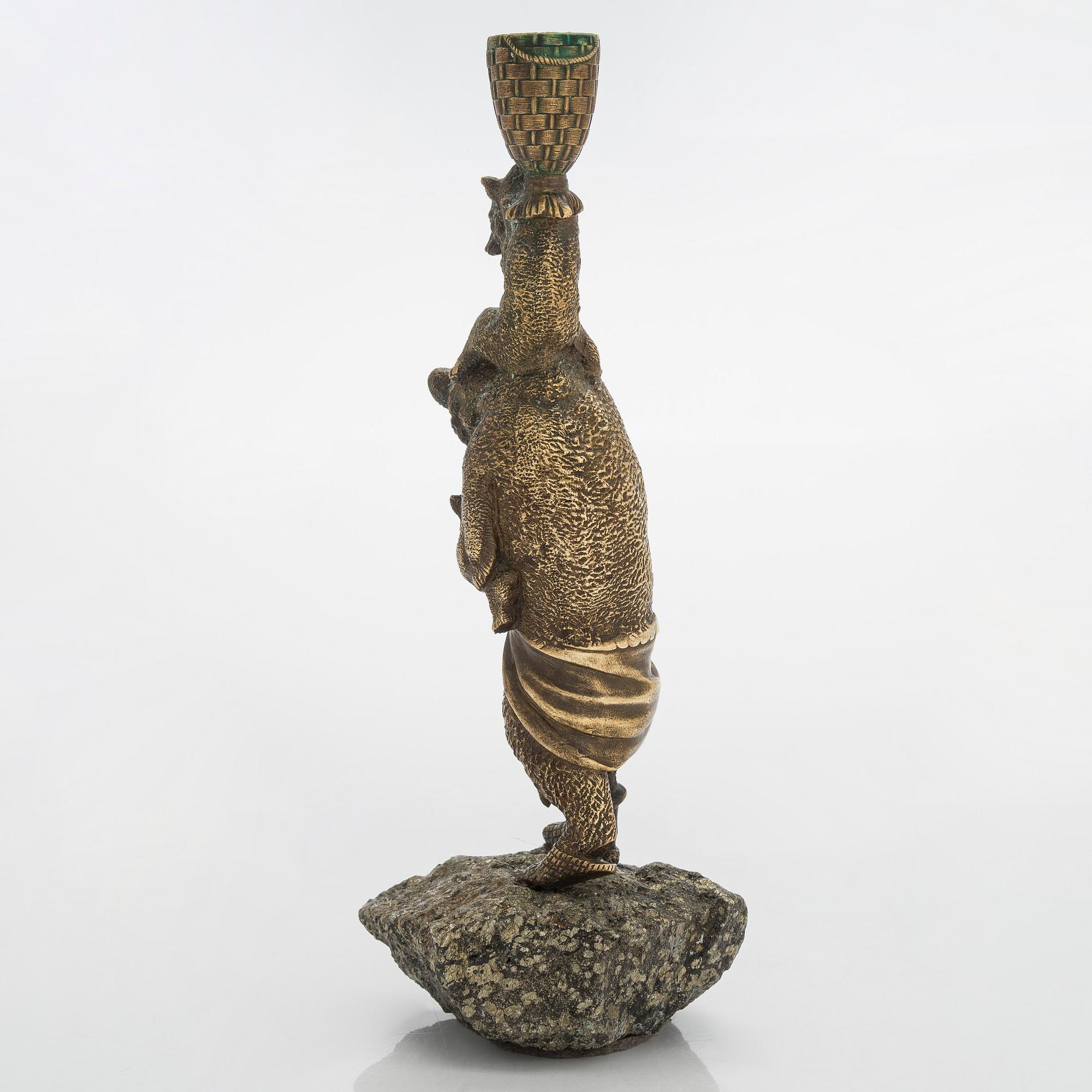 A Russian bronze candle holder, circa 1900.