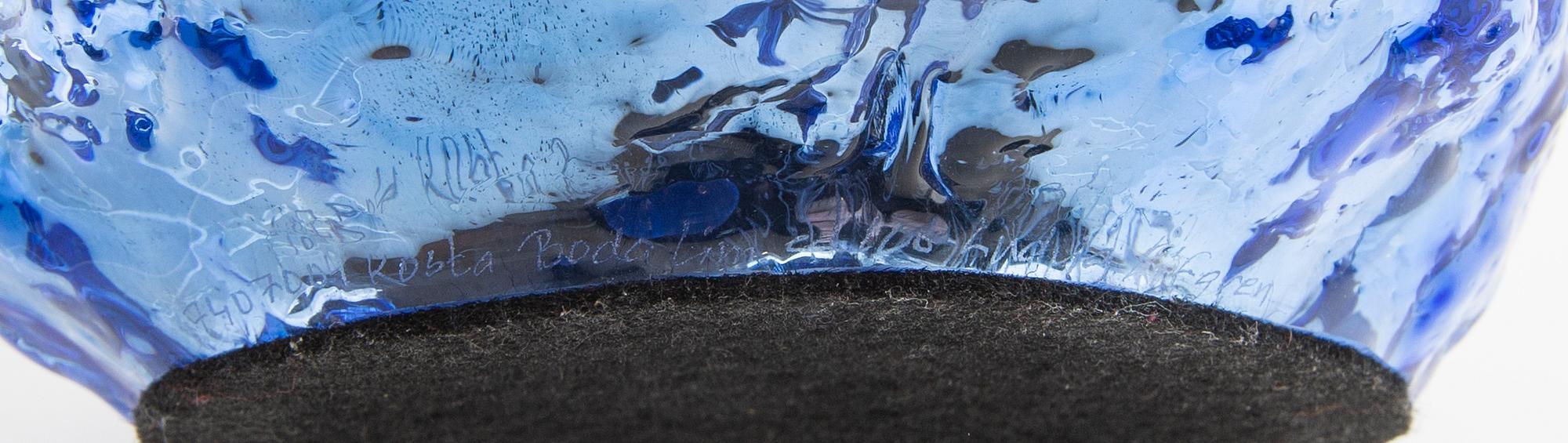 Ludvig Löfgren, a signed Kosta Boda glass figurine.