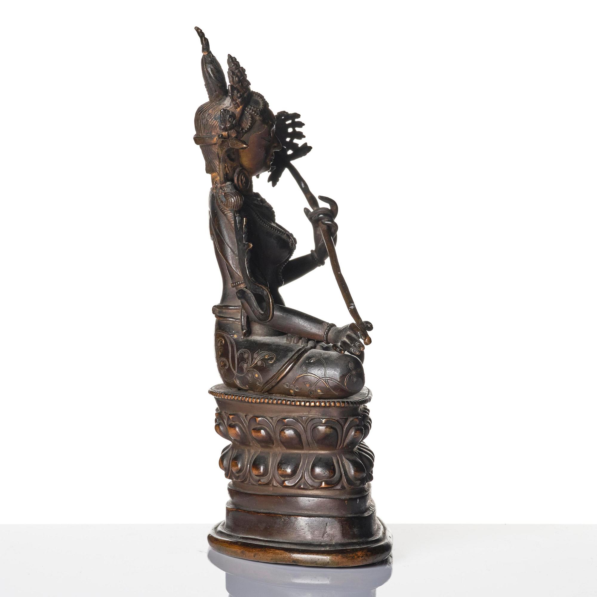 A Pala revival bronze figure of Sitatapatra, Tibet, known as the 'the white parasol Goddess', 18th century.