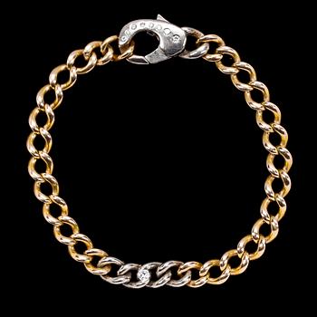 1053. BRACELET, gold set with brilliant cut diamonds, tot. app. 0.15 cts.