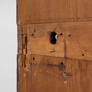 A corner hanging cabinet, dated 1844.
