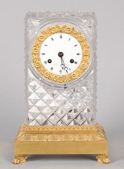 A French Empire early 19th century mantel clock by Schüller.