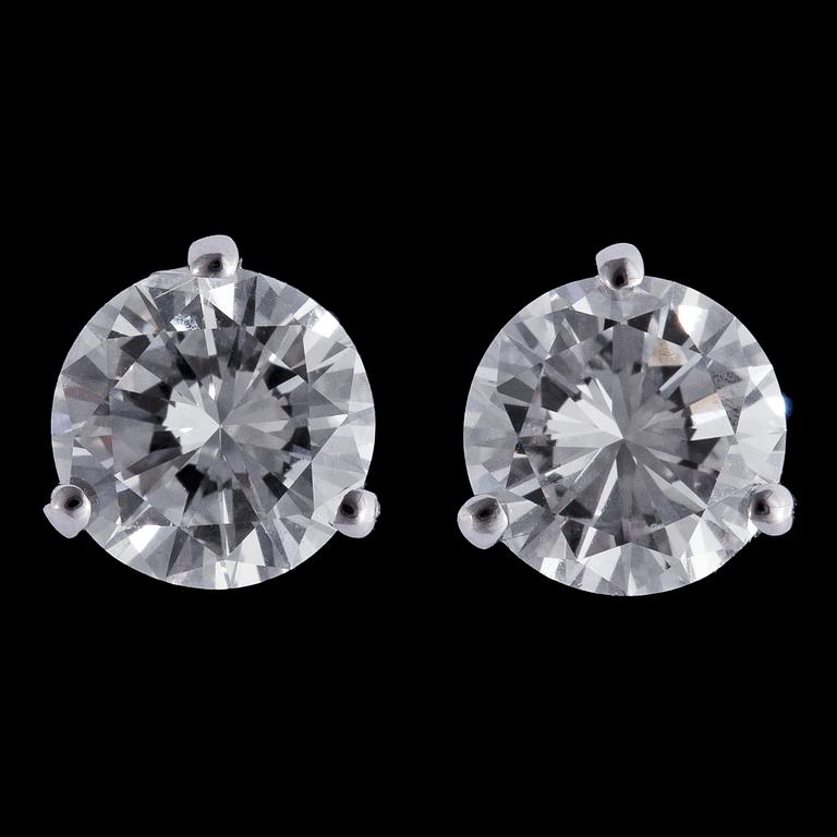 A pair of brilliant cut diamond studs, 0.74 cts, resp. 0.74 cts.