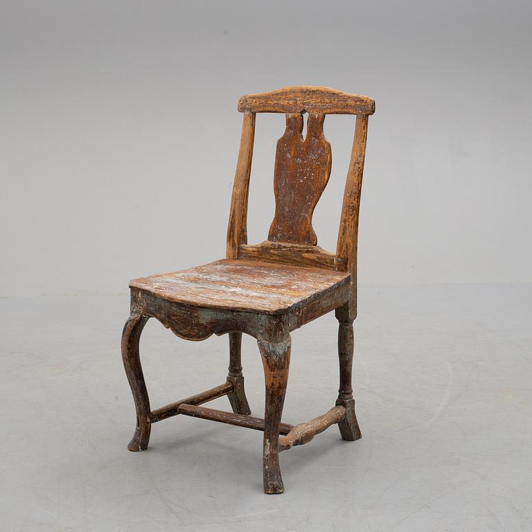 a 18th century wooden chair.