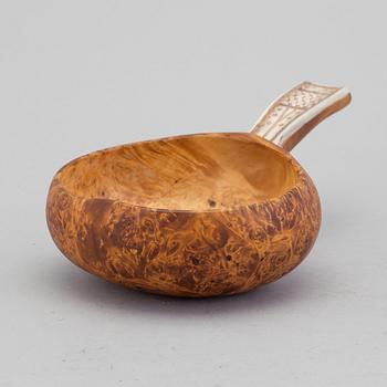 A traditional sami kåsa bowl by Lars Pirak in Jokkmokk. Signed.