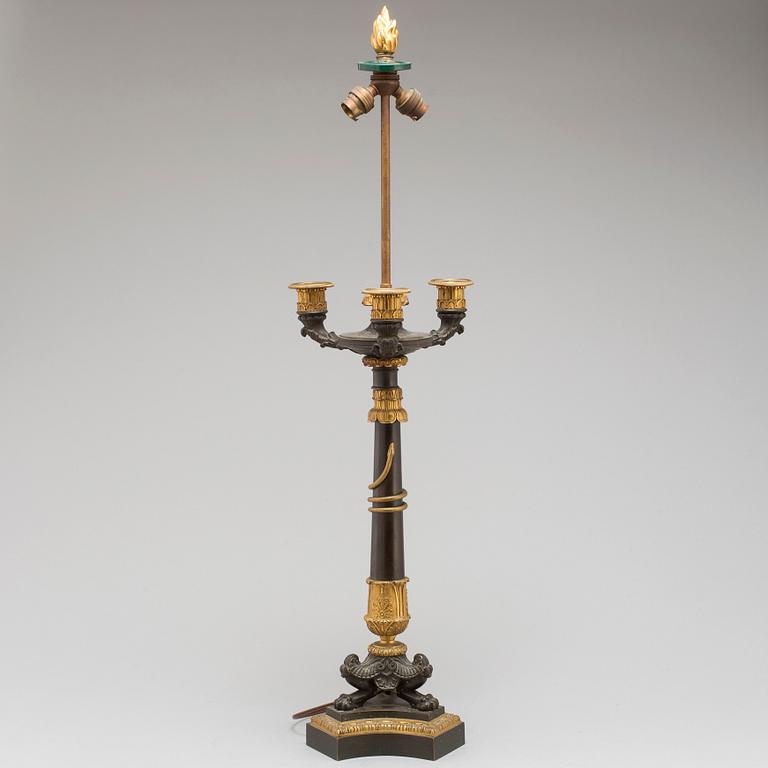 A first half of the 19th century bronze table lamp.