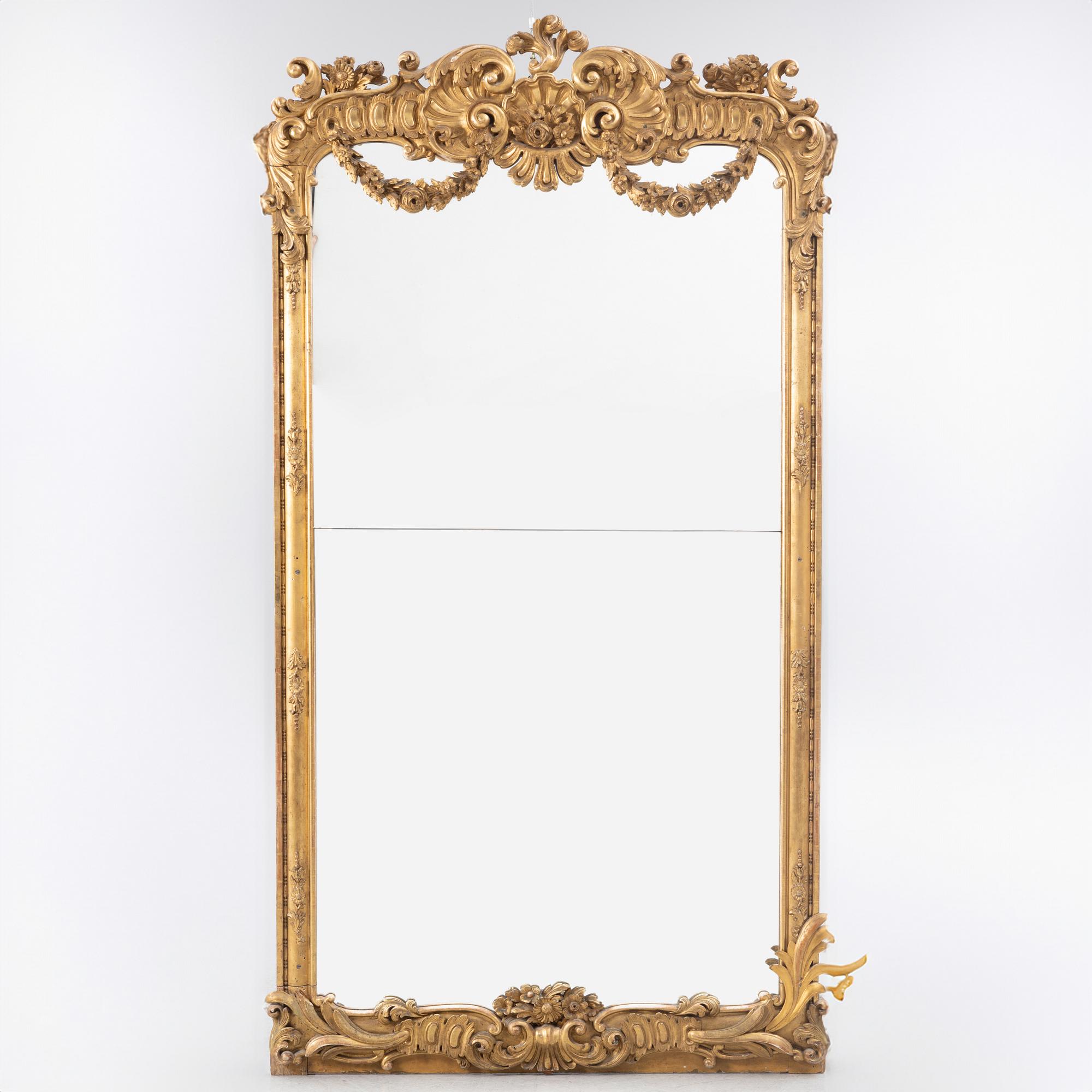A Rococo style mirror, 19th Century.