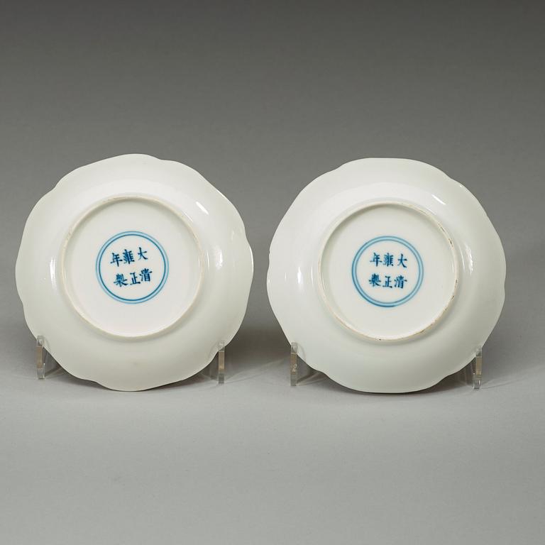 A pair of white-glazed small moulded dishes, Qing dynasty, Yongzheng six-character mark and of the period.