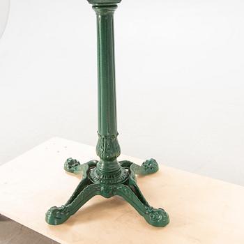 Table, cast iron base, 20th century.