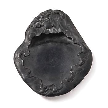 1036. A lotus leaf shaped ink stone, Qing dynasty.