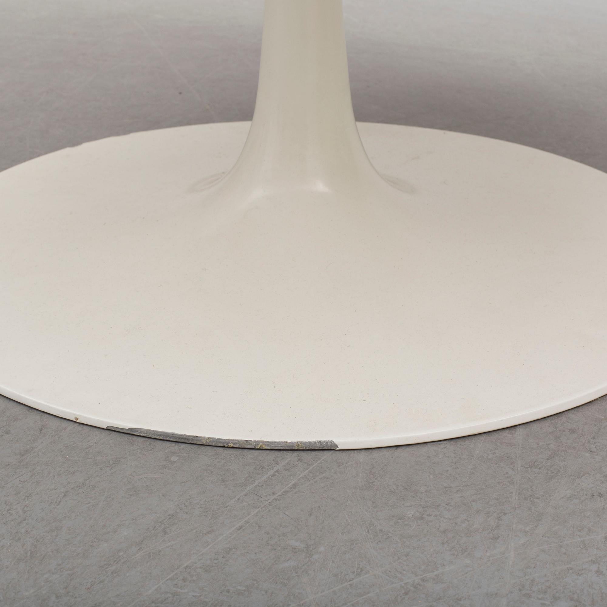 A dining table and eight chairs by Robin Day, Arkana.