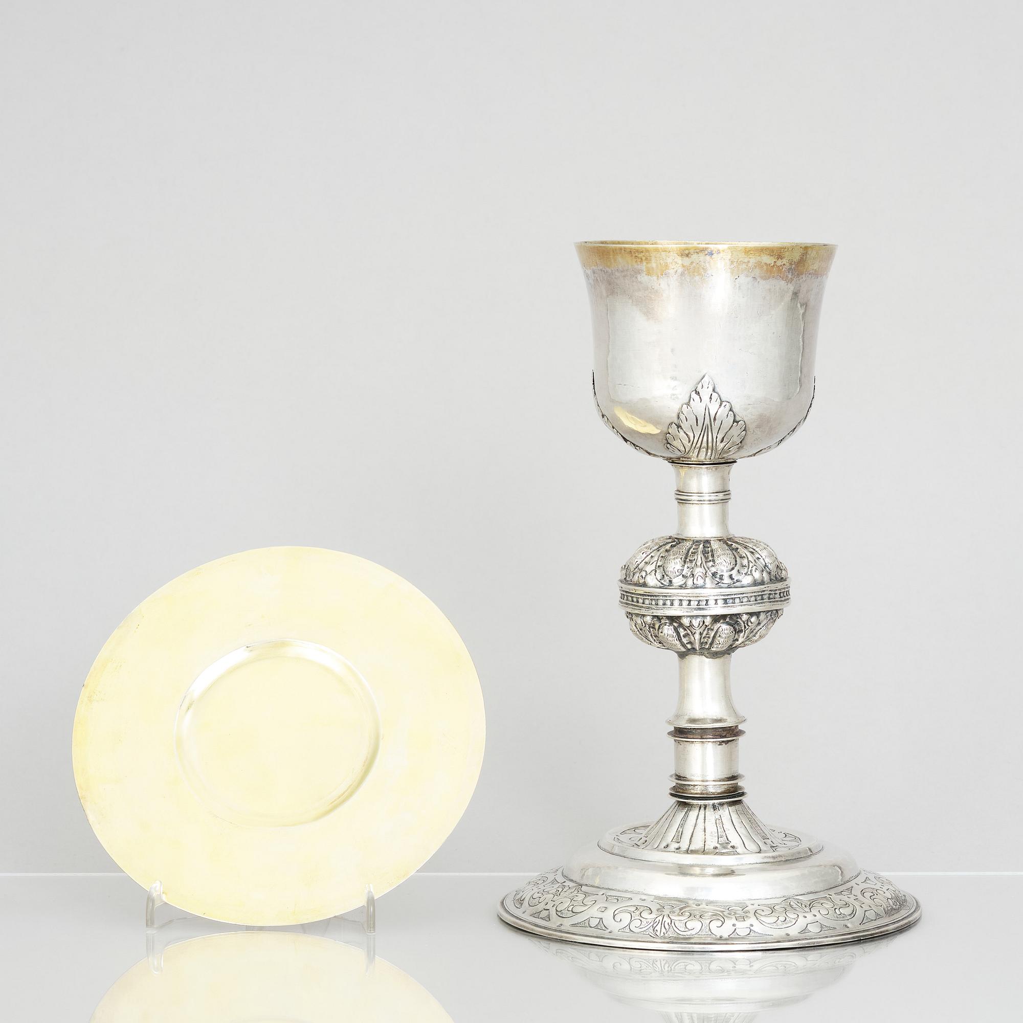 An 18th century parcel-gilt silver cup and paten, unmarked.