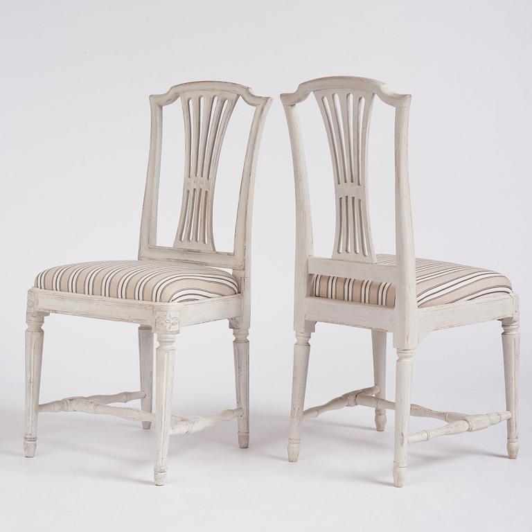 A set of twelve Gustavian chairs by J. Hammarström (master 1794-1812) and E. Ståhl (1794-1820).