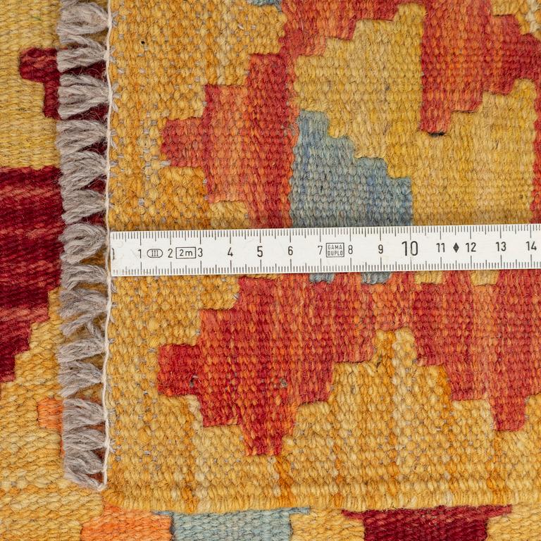 A runner, kilim 302 x 82 cm.