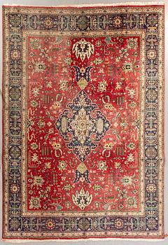 A semiantique Tabriz carpet ca 370x296 cm.