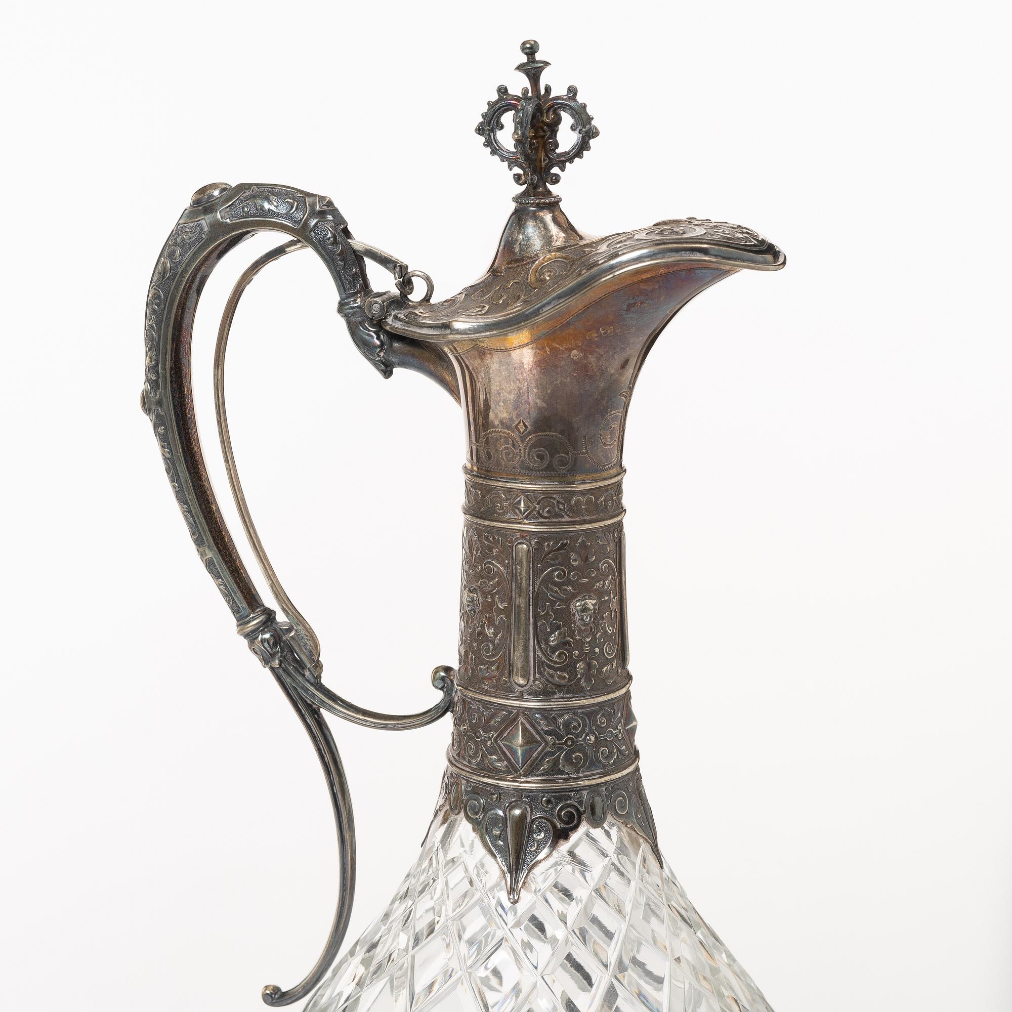 Decanters, a pair, silver and glass, with mark of G Möllenborg, Stockholm 1877.