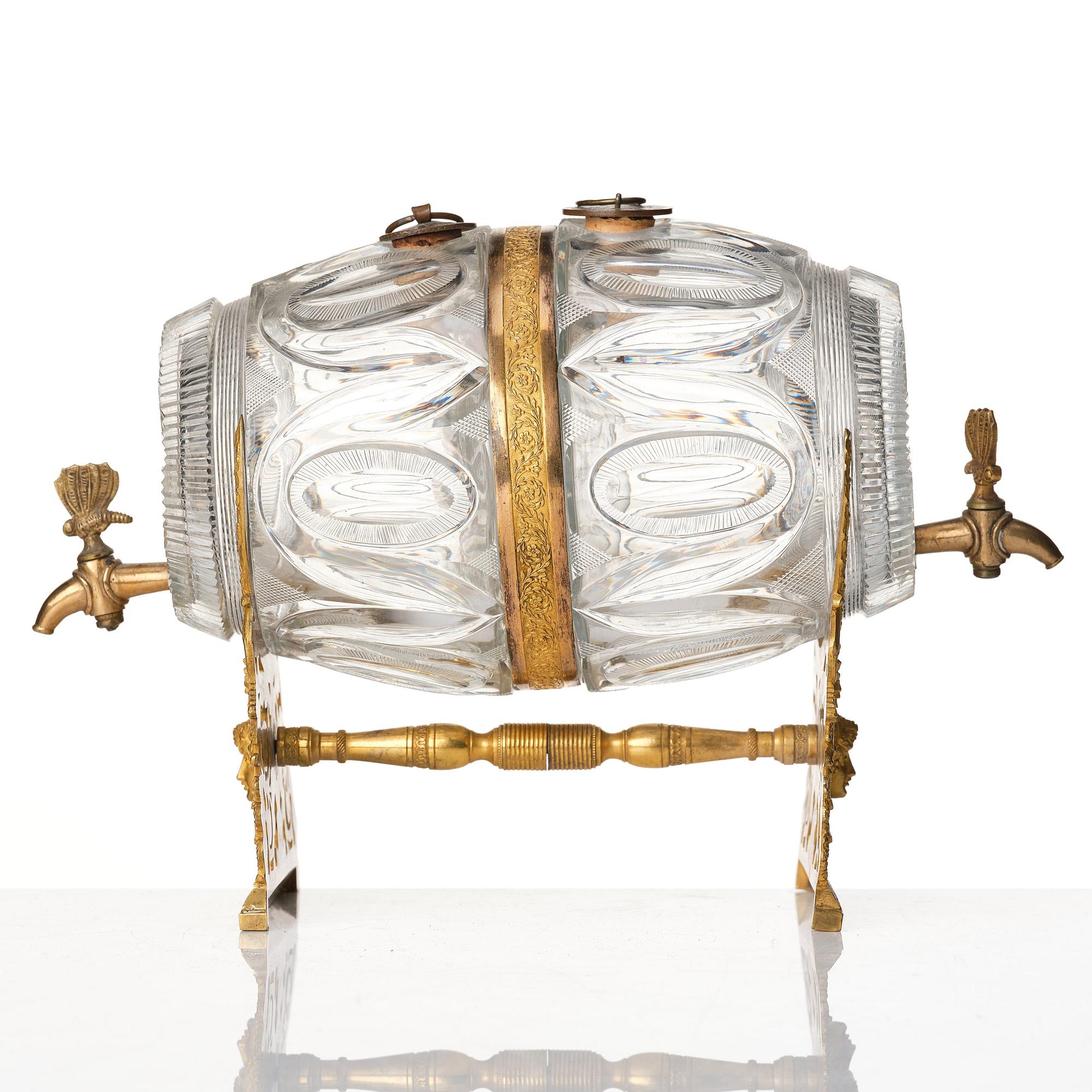 A Empire ormolu-mounted cut glass wine barrel.