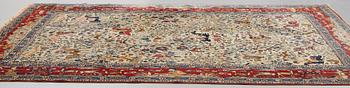 A CARPET, a semi-antique Teheran probably, a figural part silk, ca 347,5-345,5 x 242 cm.