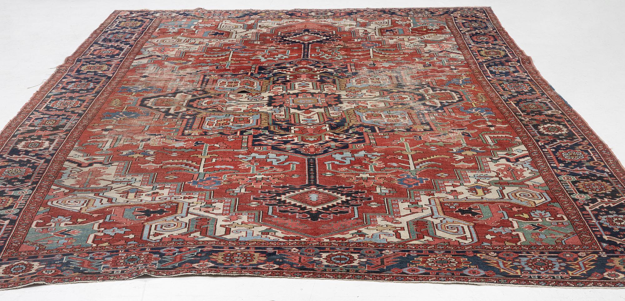 An Antique Heriz carpet, north west persia, c. 420 x 210 cm.