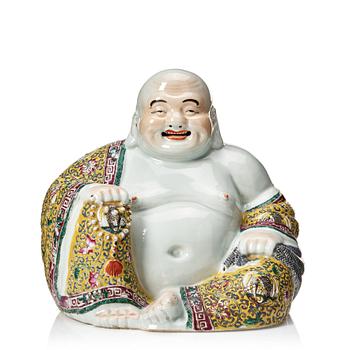 840. A Chinese famille rose figure of buddai, 20th Century.