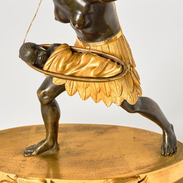 An Empire ormolu and patinated-bronze mantel clock 'La Nourrice Africaine', early 19th century.