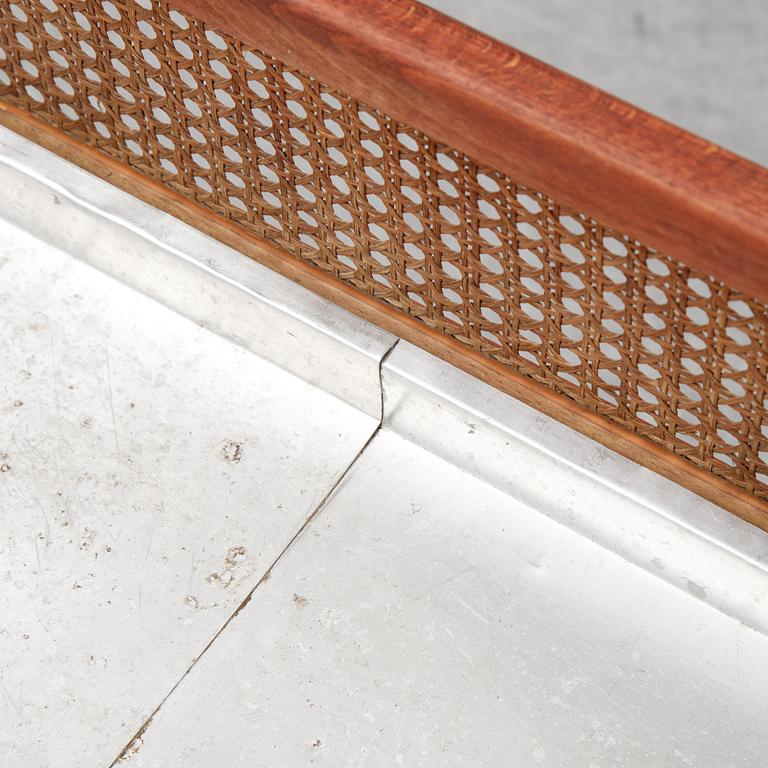 A flowertable with rattan details, late 20th century.